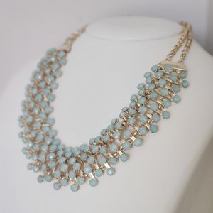 NWOT Necklace with sage green accents in gold